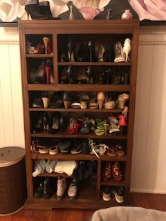 Image of my shoe cabinet. A gorgeous balinese style timber cabinet. With a new beginning my cabinet needs to go & I need to downsize my shoe collection.