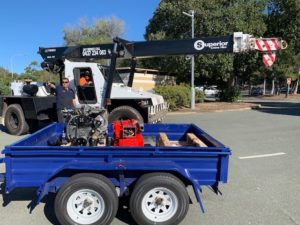 Pushing deadlines it was great to finally see this image our engine on the trailer and the crane to host her onto the boat.