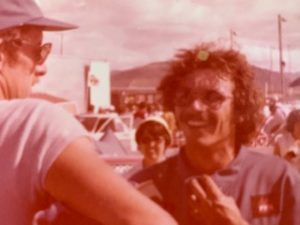 Martin back in his Fiat days talking with friends.